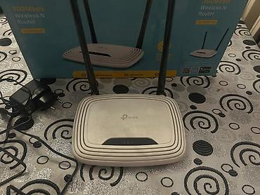 Modemlər və şəbəkə avadanlıqları: TP-Link TL-WR841N – 300Mbps Wireless N Router. - Sürət: 300 Mbps — 5