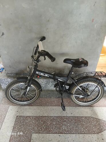купить палатку в баку: STELS markalı qara rəngli qatlanan velosiped. Bu model asan daşınma və