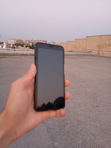 xiaomi a 40: Xiaomi Redmi 6, 32 GB, rəng - Qara, 
 İki sim kartlı, Face ID, Sensor