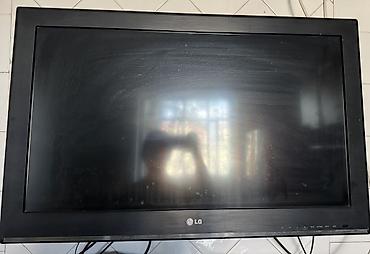 on bir tv: LG televizor (ekran ölçüsü təxminən 32”-ə yaxın) - Marka/model: LG — 1