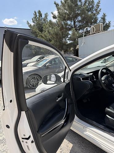 byd e6: Toyota Corolla: 2022 г., 1.8 л, Вариатор, Гибрид, Седан — 10