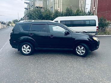Mitsubishi: Mitsubishi Outlander: 2.4 l | 2008 il 255000 km Universal — 4