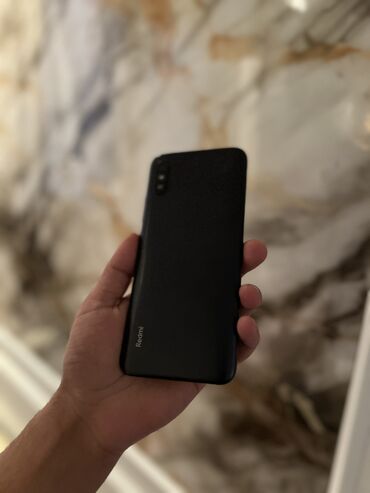 Redmi: Redmi 9A, 32 GB, rəng - Qara, Barmaq izi, Face ID — 8