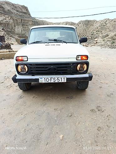 niva diskleri satilir: LADA Niva 4x4, ağ sarı rəngdə, universal kuzov. Xüsusiyyətlər: - Tam — 9
