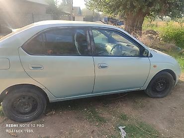 королла 120 салон: Toyota Prius: 1998 г., Автомат, Бензин, Седан — 2