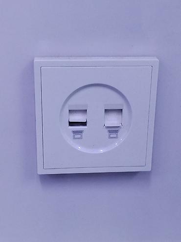 Настенная розетка с двумя портами USB для зарядки устройств