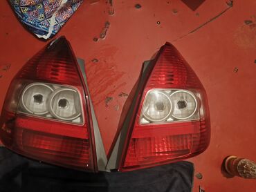 задний бампер фит: Задние фонари Honda Fit Комплектация: - Пара: левый + правый фонарь