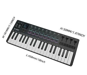 midi klavyatura: 37 klavişli midi bağli qutusunda . telefonada rahatliqla baglanir — 2