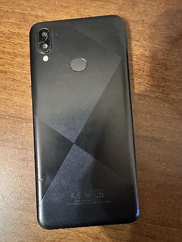 asus telefon: Satılır:Samsung - Rəng: Qara, arxa qapaqda geometrik naxış - Ekran — 2