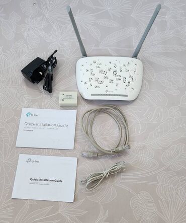 Modemlər və şəbəkə avadanlıqları: Modem router Tplink: 8961N İşləkdir,evimdə işlətmişəm ( 6 ay ).Həm — 7