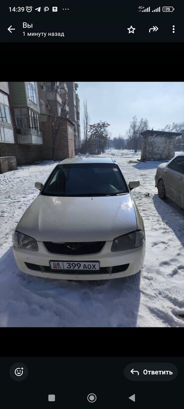 маленький автомобиль: Mazda 323: 1999 г., 1.5 л, Механика, Газ, Седан