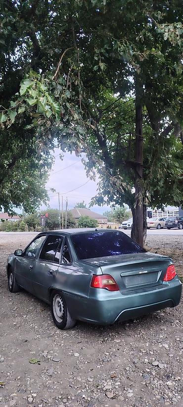 Daewoo: Model: Daewoo Nexia (sedan) Rəng: yaşıl/boz metalik Kuzov: 4 qapı — 6