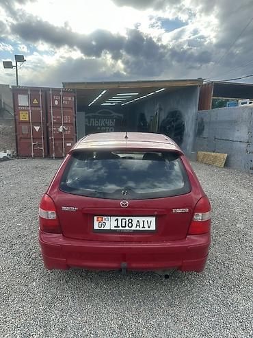 bmw e32: Mazda 323: 1998 г., 1.5 л, Механика, Бензин, Хэтчбэк — 3