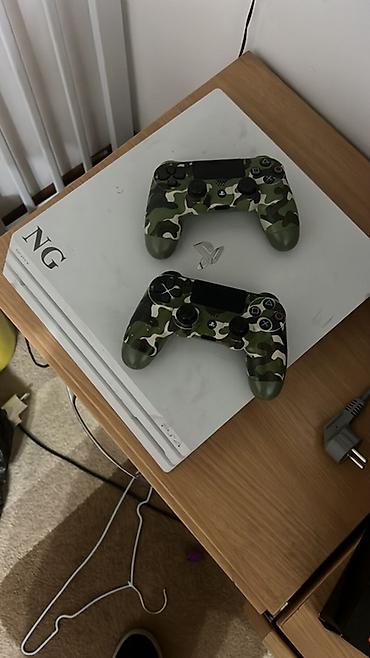 fmcb ps2: Игровая консоль PlayStation 4 Pro (белая) с двумя беспроводными — 1