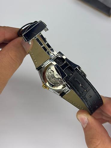 Şəxsi əşyalar: Omega Constellation kişi saatı – Avtomatik mexanizmli - Korpus — 4