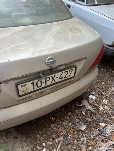 nişan tida: Nissan Sunny: 1.6 l | 2005 il Sedan