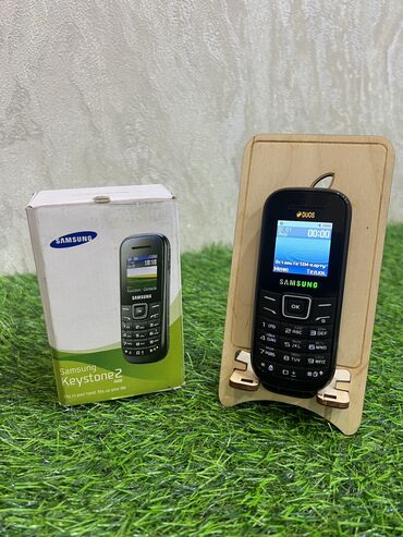кнопочный самсунг: Samsung GT-E1210, Новый, < 2 ГБ, цвет - Черный, 2 SIM