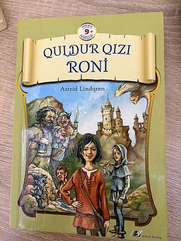 Astrid Lindgrenin **“Quldur qızı Roni”** adlı uşaq kitabı. Kitabın üz