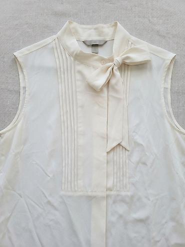 svecane kosulje za zene: H&M bezrukavna bluza sa mašnom na kragni - Model: ženska bluza — 2