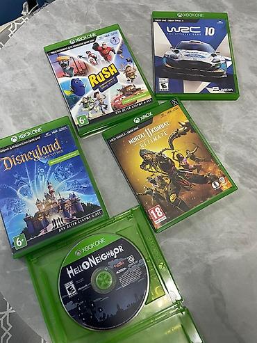 a 11: Xbox One üçün oyun diskləri dəsti təqdim olunur. Şəkildə bir neçə — 1