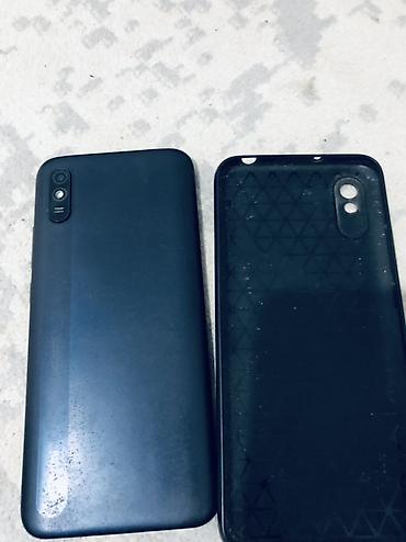 Redmi: Смартфон Redmi 9а (серия A/Go по дизайну). Черный цвет. Основные — 8