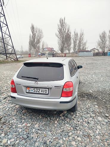 mazda f: Mazda 323: 1999 г., 1.5 л, Механика, Бензин, Универсал — 4