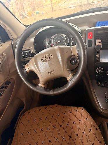 Hyundai: Hyundai Tucson: 2.5 l | 2006 il Universal — 9