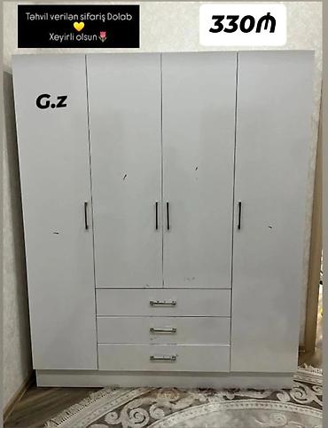 ofis dolab: Məhsul: 4 qapılı paltar dolabı Təsvir: - Rəng: ağ - Ön hissə: 4 ədəd — 1