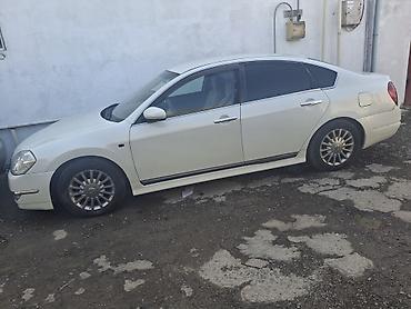 masin ucun kandisaner: Nissan Teana: 2.3 l | 2006 il Sedan — 6