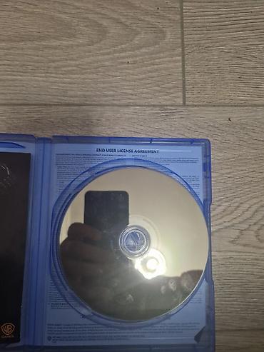 ps3 mortal kombat: PlayStation disk formatında videooyun diski və mavi plastik qoruyucu — 1