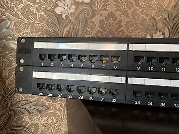 Кабельные органайзеры: Патч-панель TRIPP LITE, 48 портов, Cat 5e, 2U, для монтажa в 19" — 2