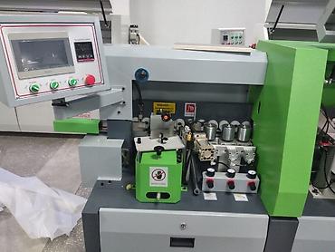 Кромкооблицовочные станки: Asia bridge снг* представляет обновлённый **кромко-клеющмй станок*md — 10