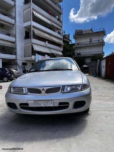 Transport: Mitsubishi Carisma: 1.6 l | 1999 year | 221200 km. Limousine