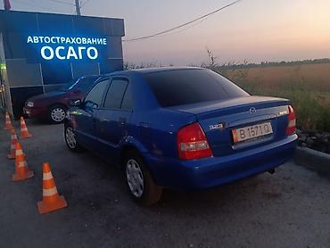 mini car: Mazda 323: 2003 г., 1.6 л, Механика, Бензин, Седан — 2