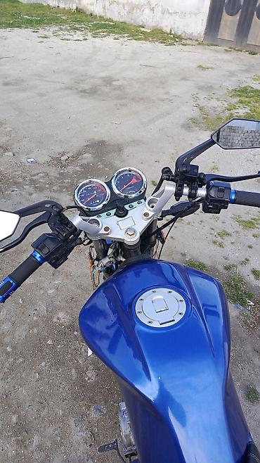 Мотоциклы: Mavi rəngli yol tipli motosiklet Texniki və dizayn xüsusiyyətləri: - — 4
