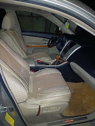 Другие детали салона: Lexus RX 330) — интерьер и оснащение - Рулевое колесо с — 6