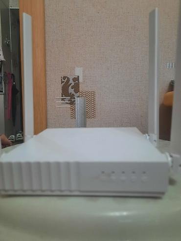 Двухдиапазонный Wi‑Fi роутер с четырьмя внешними антеннами -