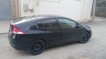 Honda: Honda Insight: 1.3 l | 2011 il Sedan — 9