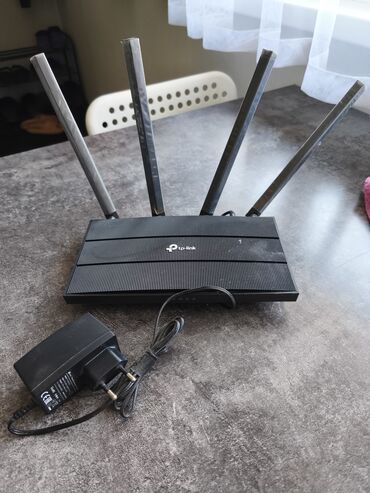 tp link настольный коммутатор: Беспроводной маршрутизатор TP-Link черного цвета с четырьмя внешними
