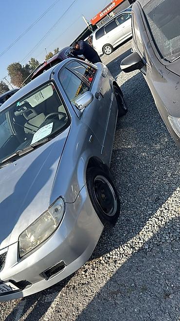 forester 2004: Mazda 323: 2003 г., 1.3 л, Механика, Бензин, Седан — 3