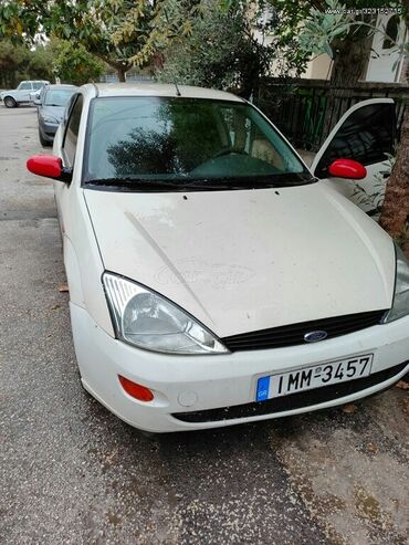 Transport: Ford Focus: 1.4 l | 2001 year | 172000 km. Coupe/Sports