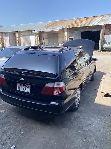 жукили: Nissan Primera: 2000 г., 1.8 л, Механика, Бензин, Универсал — 6