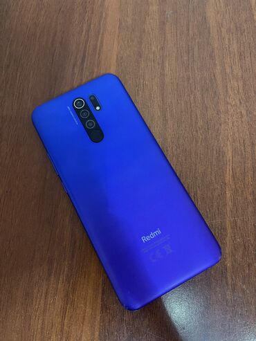 телефон в оше: Xiaomi, Redmi 9, Б/у, 64 ГБ, цвет - Фиолетовый, 2 SIM