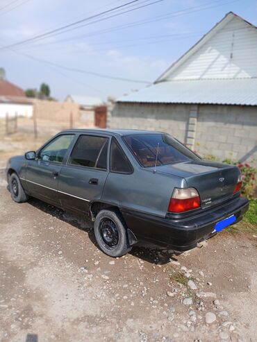 объем 1: Daewoo Nexia: 1998 г., 1.5 л, Механика, Бензин, Седан