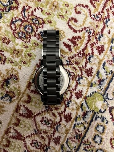 apple watch series 1: Kişi qol saatı – qara metal korpus və metal qolbaq - Dizayn: Ön üzü — 2