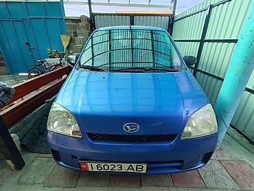 авто бак: Daihatsu Cuore: 2003 г., Механика, Бензин, Хэтчбэк — 2