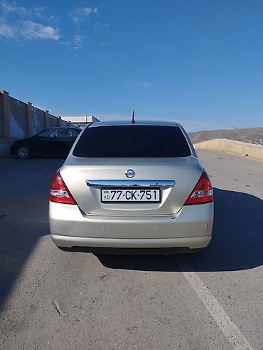 Nissan: Nissan Tiida: 1.6 l | Sedan — 12