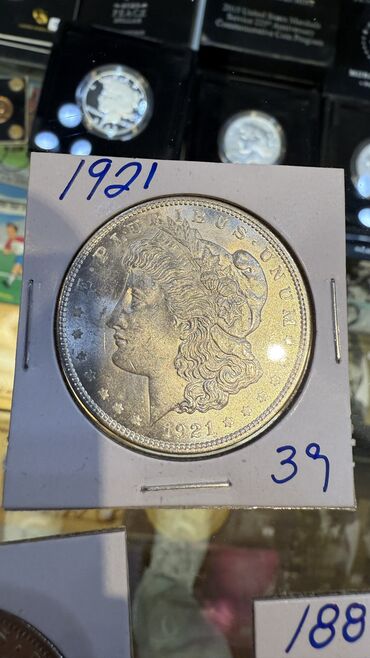 продаю золотые монеты: Morgan Dollar UNC без грейда