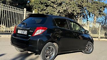 bort baqaj: Toyota Vitz (Yaris) hatchback - Kuzov: 5 qapılı, qara rəng - — 2