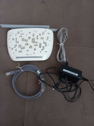 Modemlər və şəbəkə avadanlıqları: Tp link modem 2 ədəd ethernet kabelu 1 ədəd adapter ilə